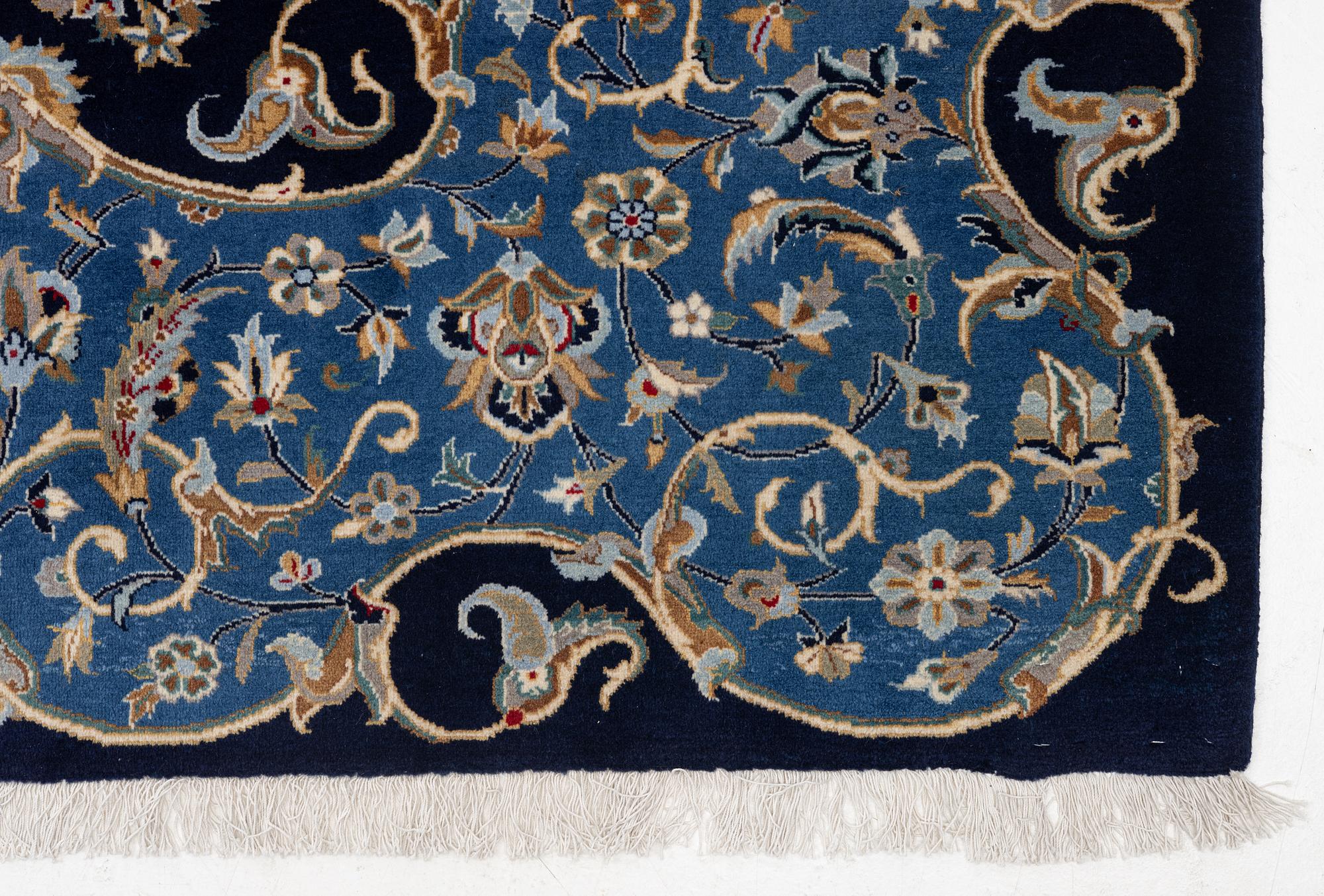 A Royal Keshan carpet, signed, c. 395 x 295 cm.