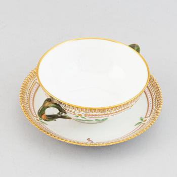 Royal Copenhagen, A 'Flora Danica' porcelain soup cup with saucer.