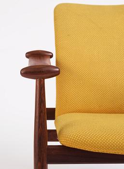 Finn Juhl, a 'model F-133' rosewood easy chair by France & Son, Denmark 1960s.