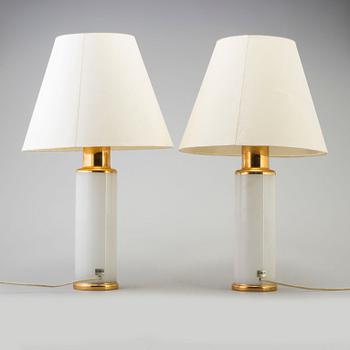 A pair of glass table lights by Luxus.