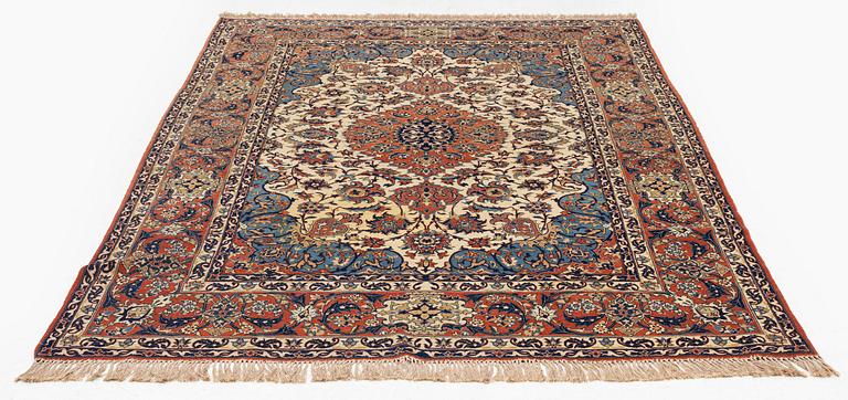 An antique/semi-antique Isfahan, rug c. 239 x 143 cm.