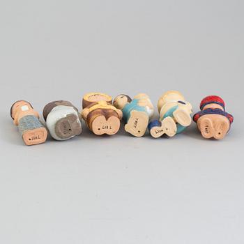 A collection of six stonewear figurines from the series "All världens barn" by Lisa Larson for Gustavsberg.