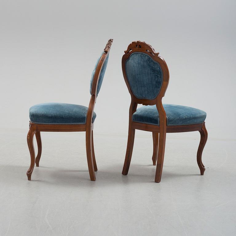 Six late 19th century walnut chairs.