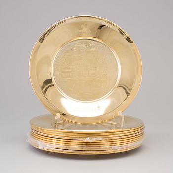 12 brass plates from Skultuna, late 20th century.