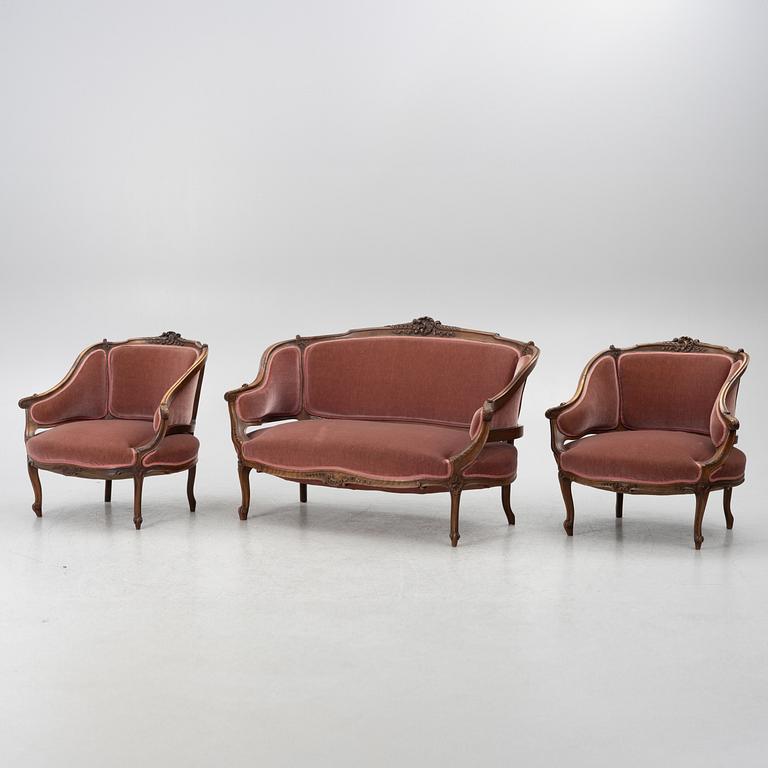 Sofa, 2 armchairs, 4 chairs, table and banquet, Rococo style, 20th century.