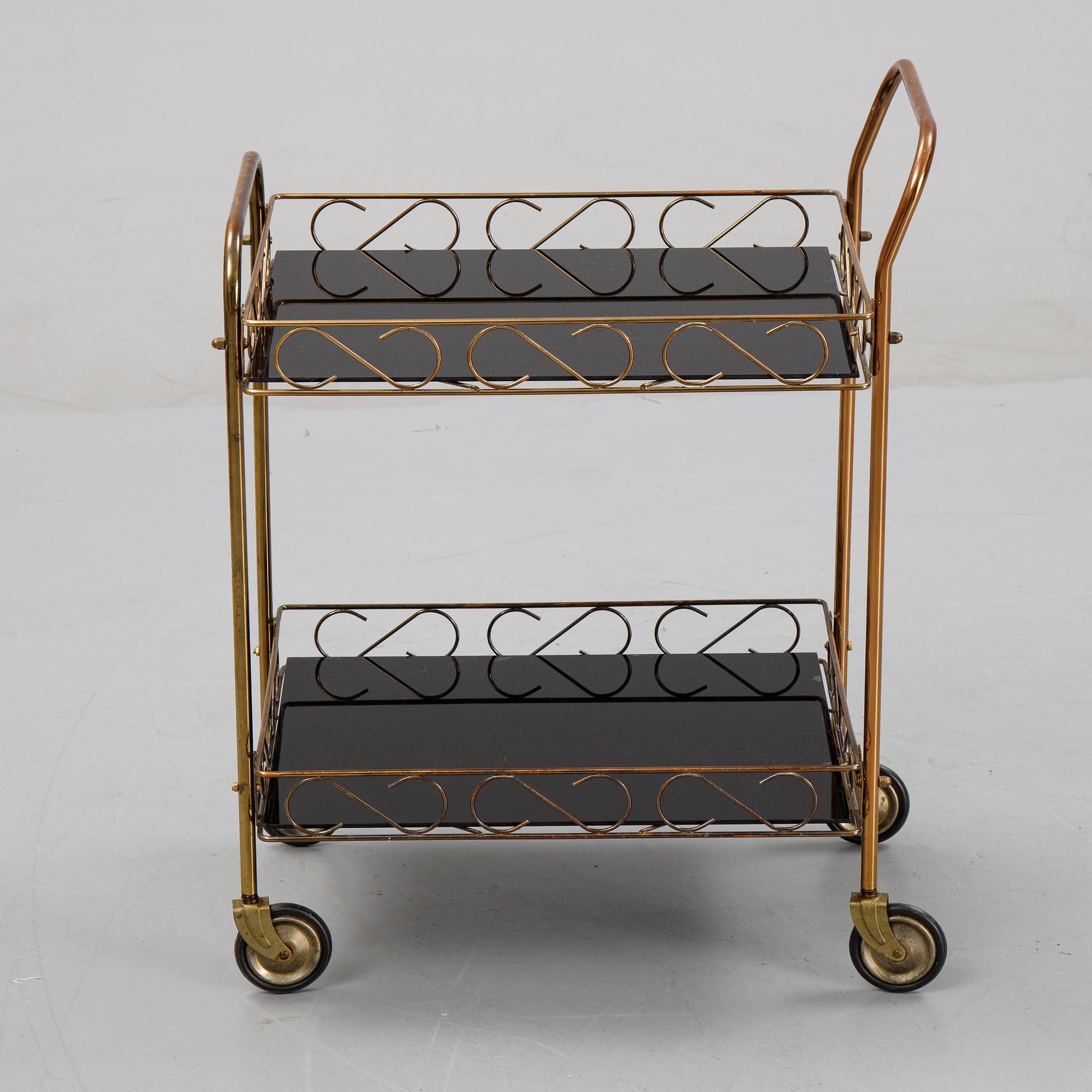 A brass and glass serving trolley, later part of the 20th Century.