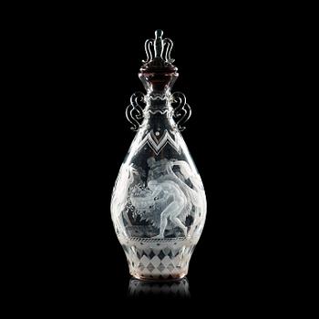 232. A Simon Gate engraved glass decanter with stopper, Orrefors 1925.