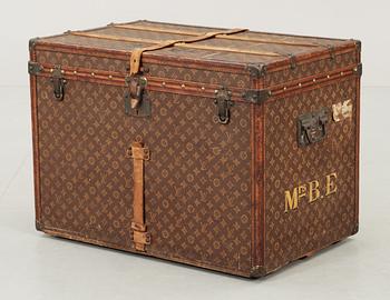 576. An early 20th cent monogram canvas trunk by Louis Vuitton.