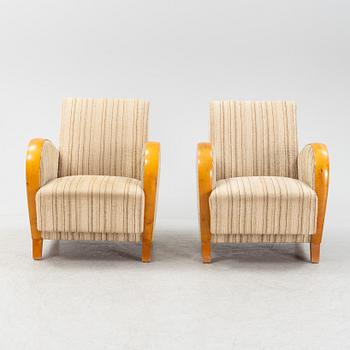 A pair of Swedish Modern easy chairs, Dux T-serie, 1940's/50's.