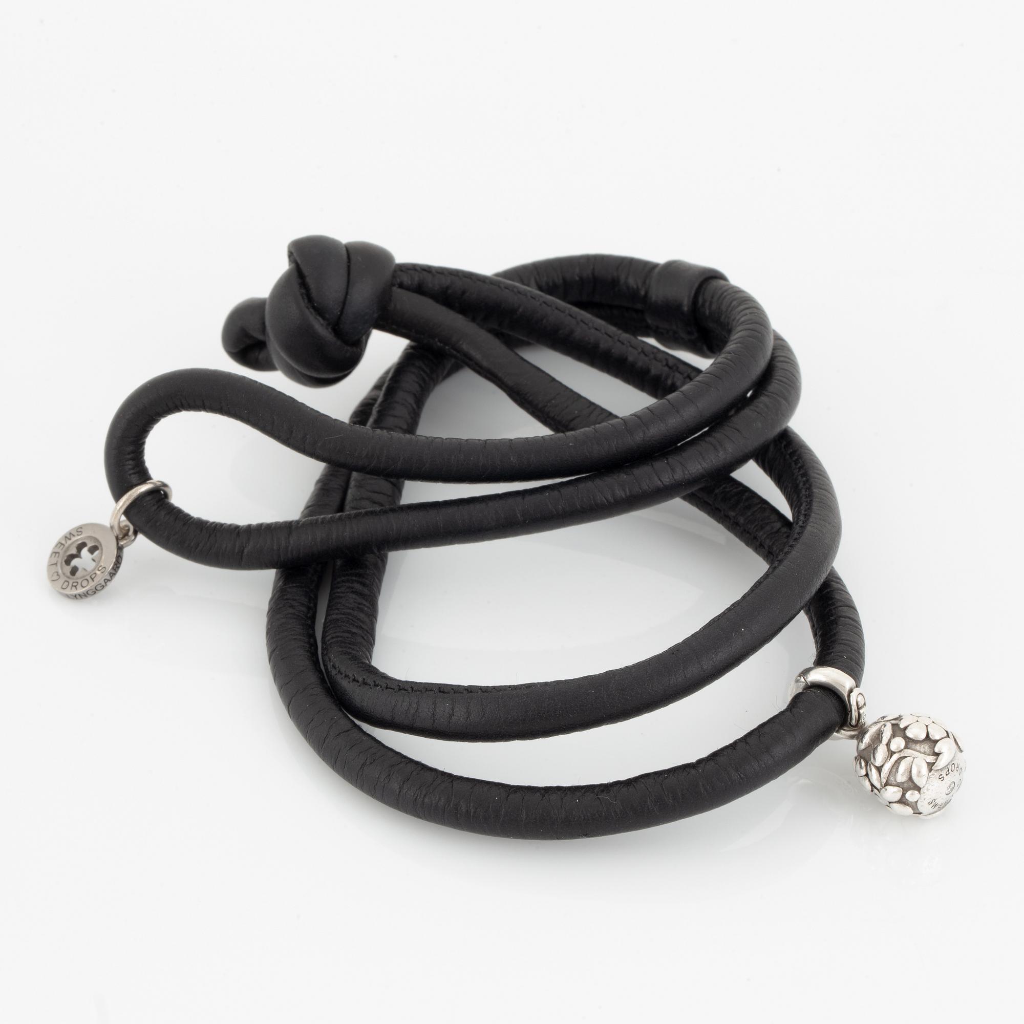 OLE LYNGGAARD,  "sweet drops", armband samt berlock i silver med briljantslipad diamant.