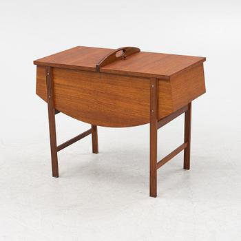 A teak veneered sewing table, mid 20th Century.