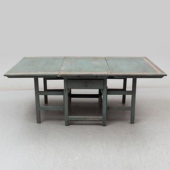 Two 19th Century gate leg tables with similar painting.