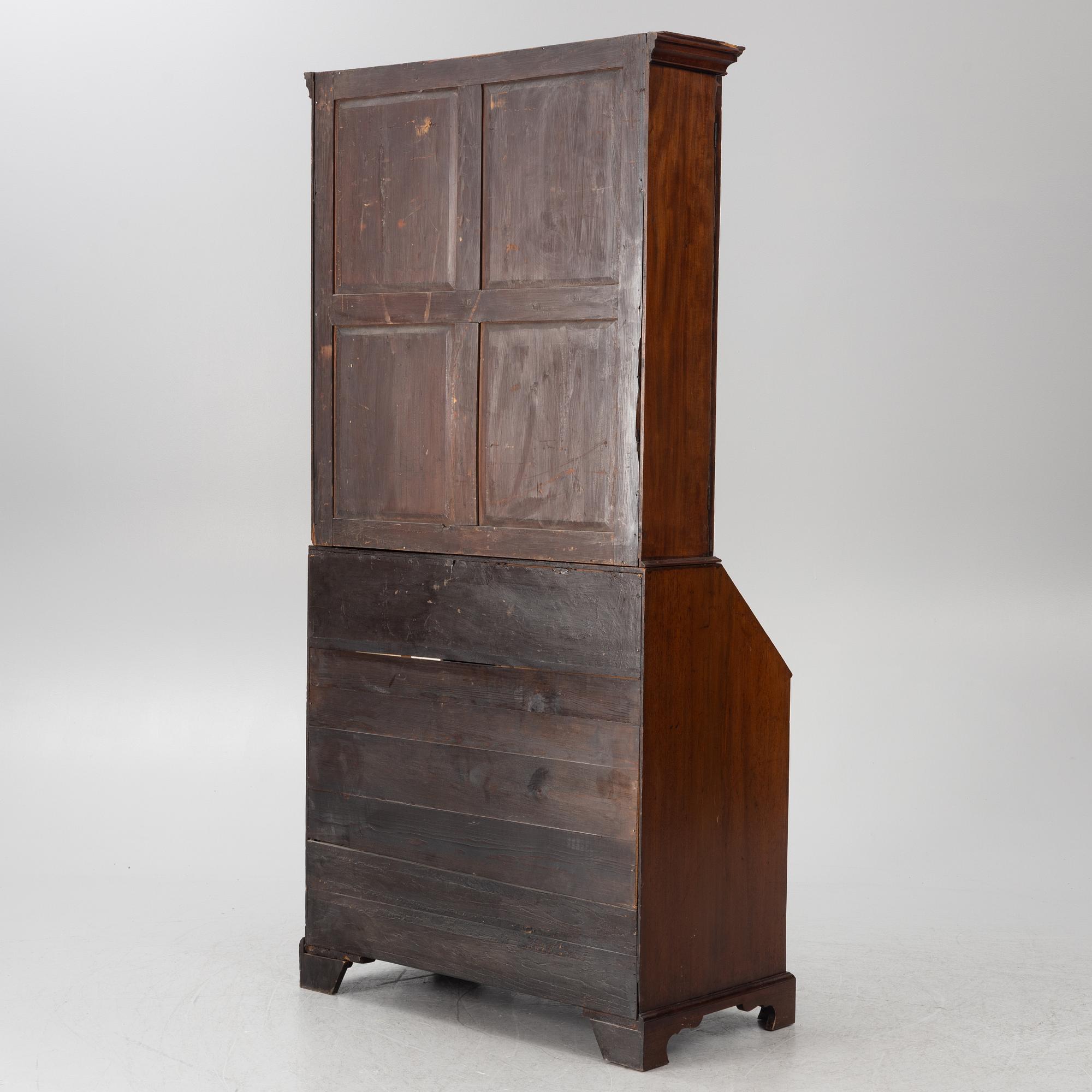 An English mahogany cabinet, 19th Century.
