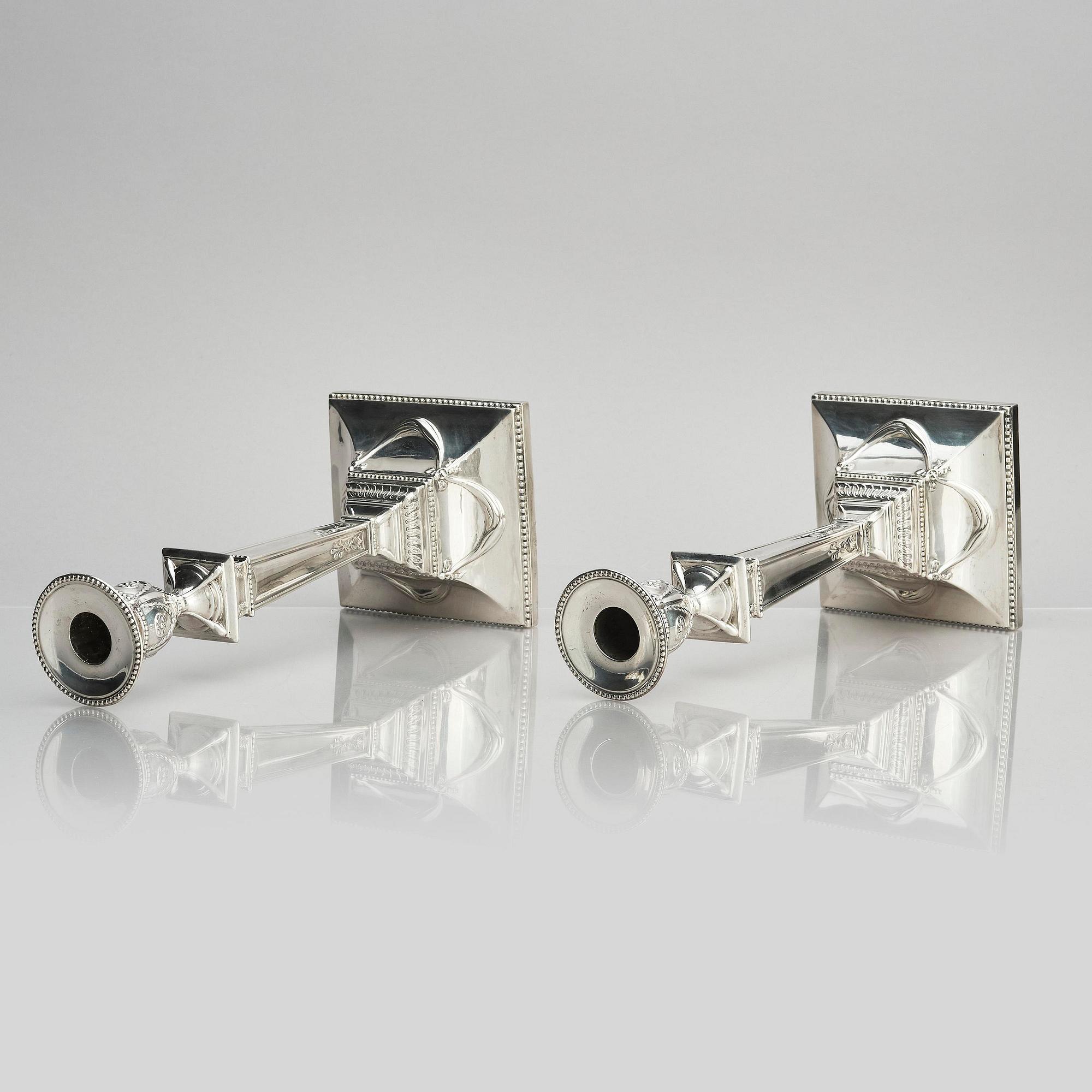 A pair of silver candlesticks, marks of John Parsons & Co, Sheffield, possibly 1784-85.