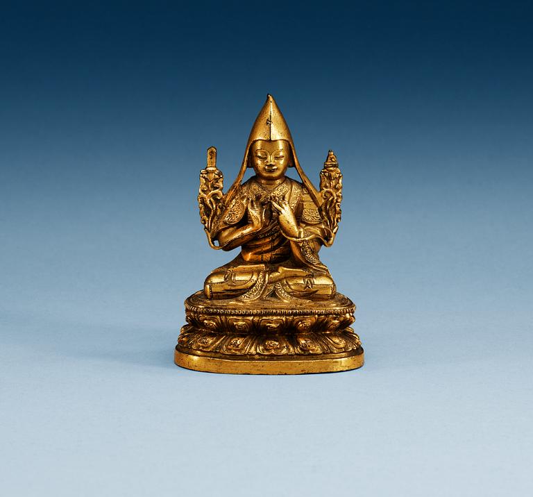 A gilt-bronze seated figure of a Lama, presumably Second Khalka Jetsun Dampa, Mongolia, presumably 18th Century.