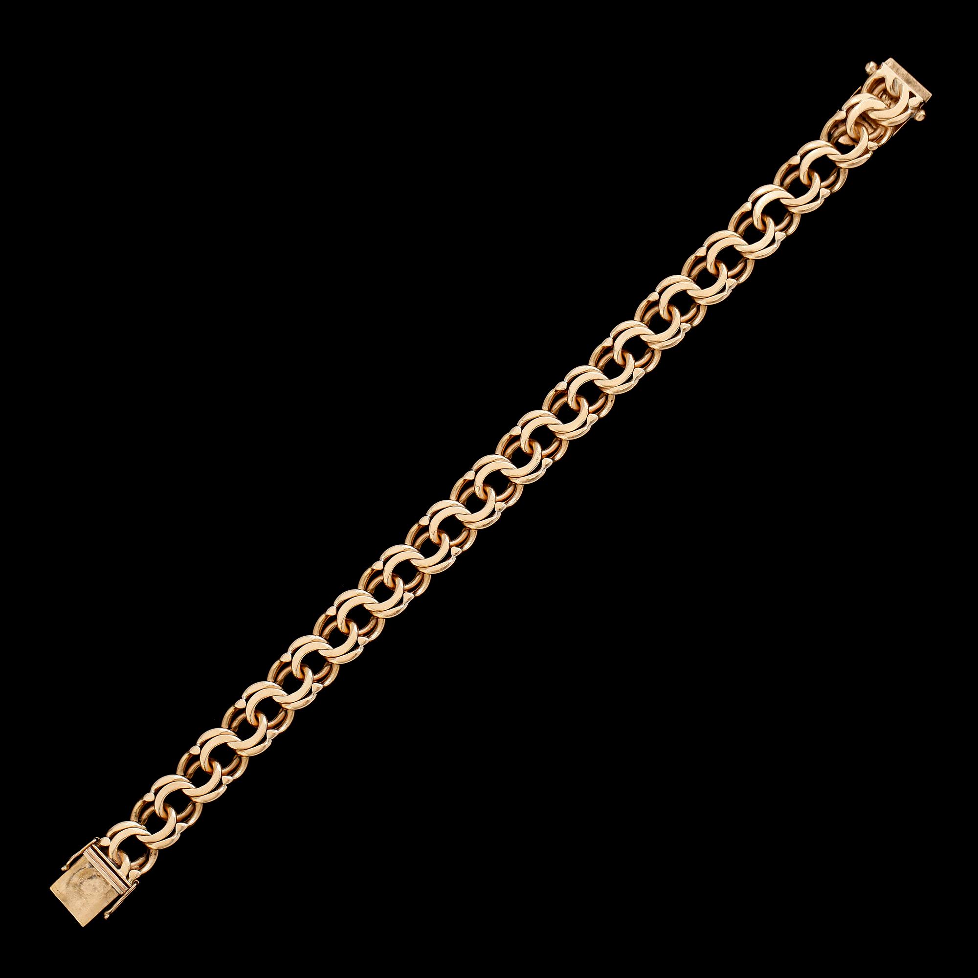 ARMBAND, 18 k guld, bolidenguld, 1947. Total vikt ca 31 g.