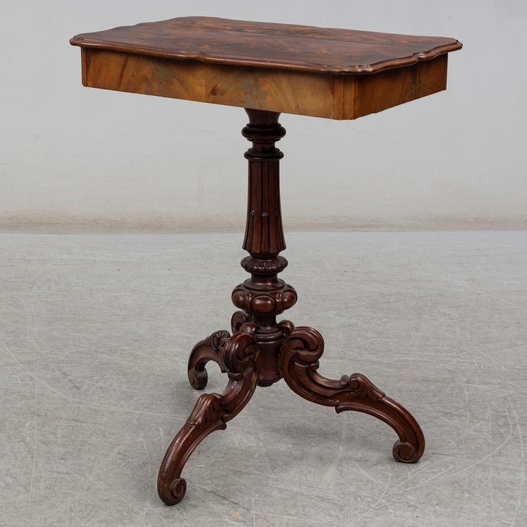 A Neo-Rococo 19th century sewing table.