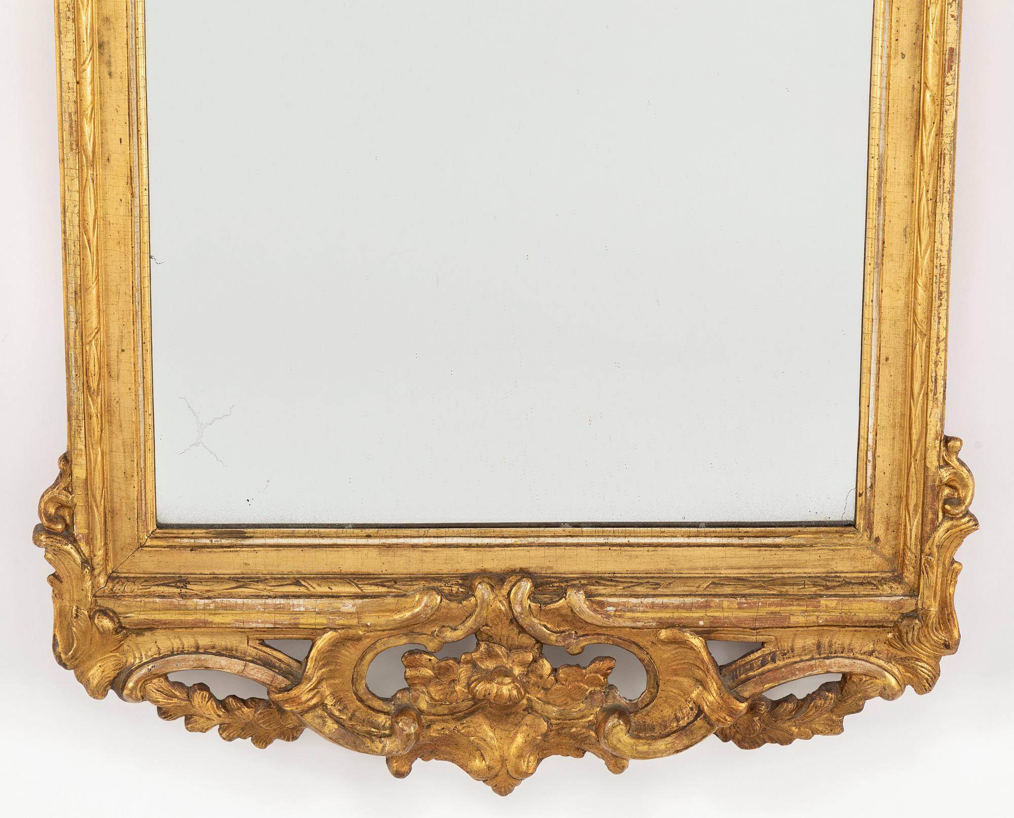 A Rococo mirror by Niclas Meunier, (Stockholm 1754-1797).