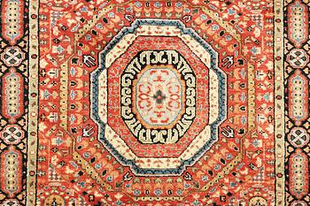 A Mamluk design carpet, c. 304 x 235 cm.