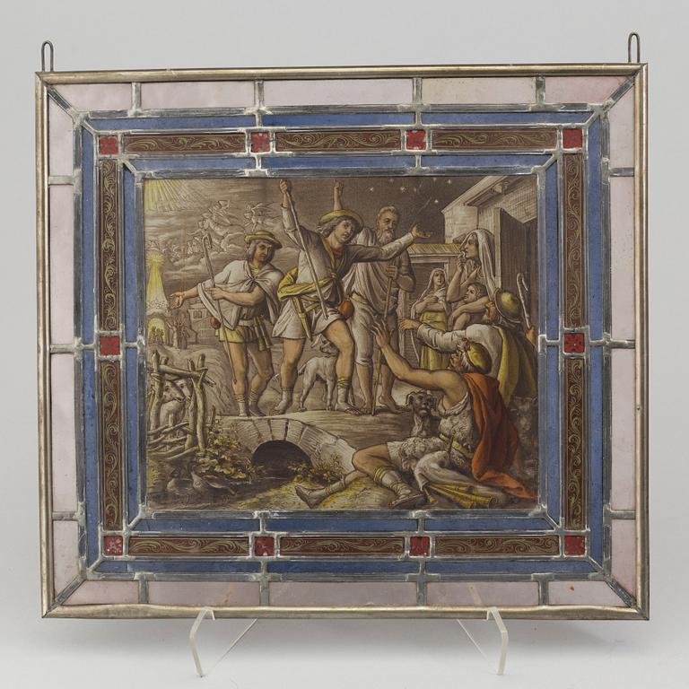 A pair of stained glass windows, circa 1900.