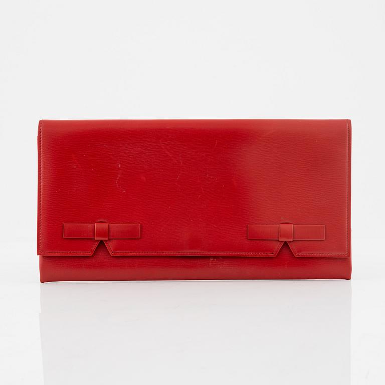 Christian Dior, a red box calf leather clutch.