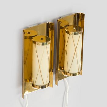 A pair of mid 20th century wall lights for Aris, Arisuo, Finland.
