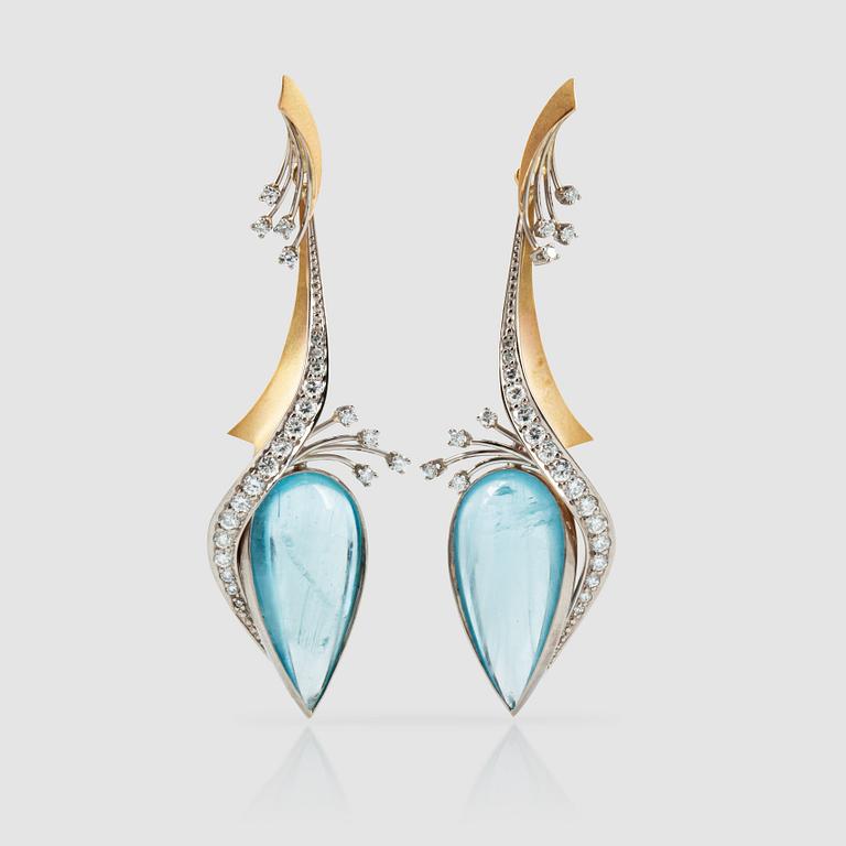 A pair of cabochon-cut aquamarines and brilliant-cut diamonds. Total carat weight of diamonds circa 1.20 cts.