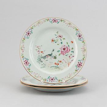 Three famille rose 'double peacock' plates, Qing dynasty, Qianlong (1736-95).