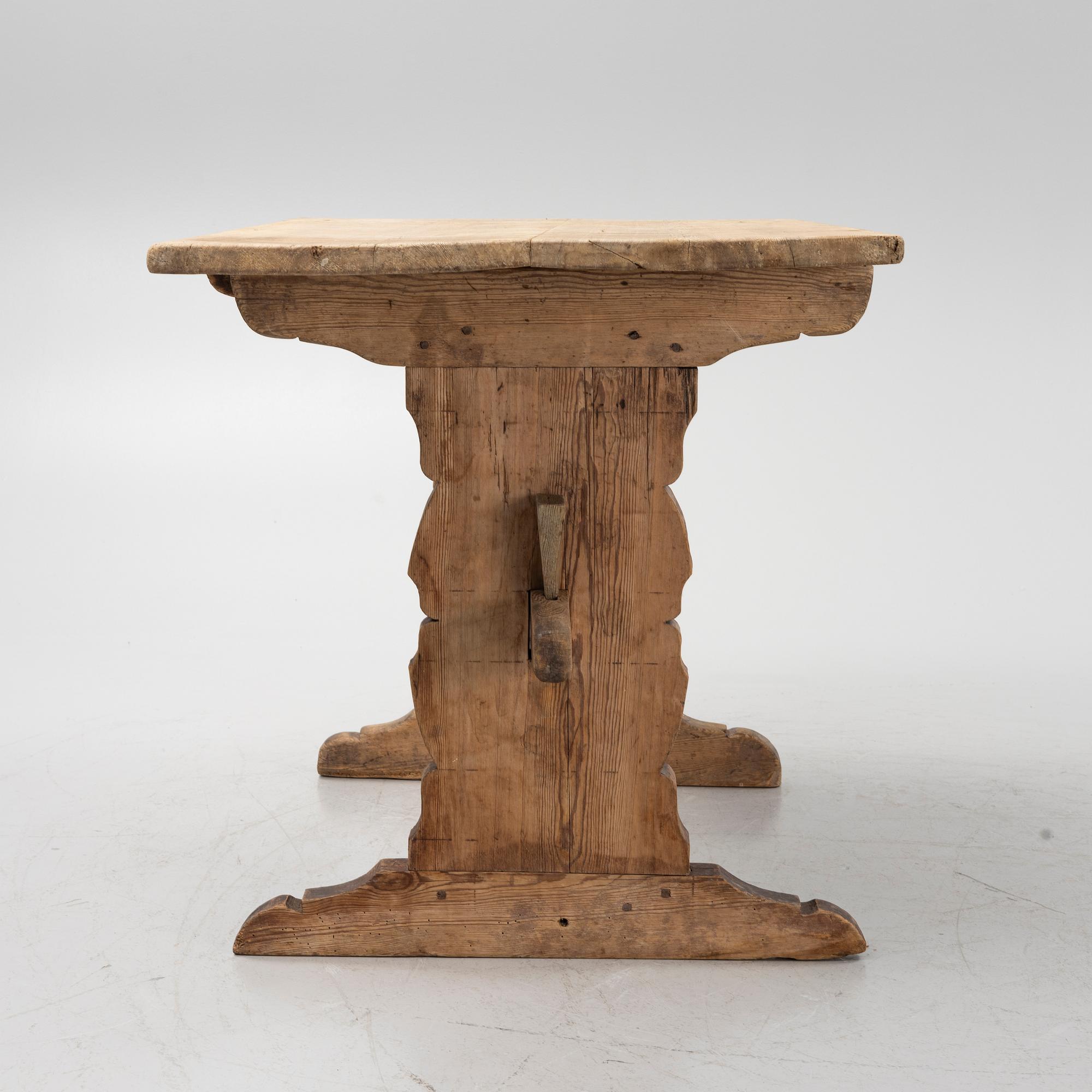 A pine trestle table, 19th century.