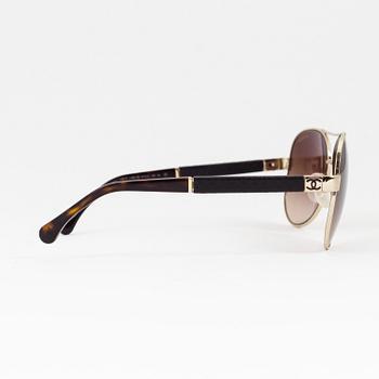 Chanel, sunglasses.