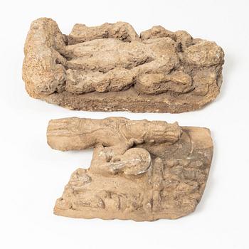 Two Indian stone fragments, 19th century or older.