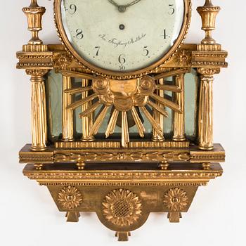 A late gustavian giltwood and parcel gilt cartel clock by J. Forsberg (active ib Stockholm 1793-1806).