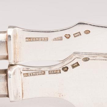 Silver serving cutlery, three with mark of Ferdinand Timper, Helsinki 1901-02 and a pair with German marks, ca. 1900.