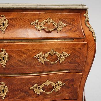 A Swedish rococo rosewood and gilt brass-mounted commode, later part of the 18th century.