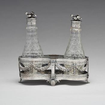 A Swedish 18th century silver and glass cruet-set, mark of Petter Eneroth, Stockholm 1780.