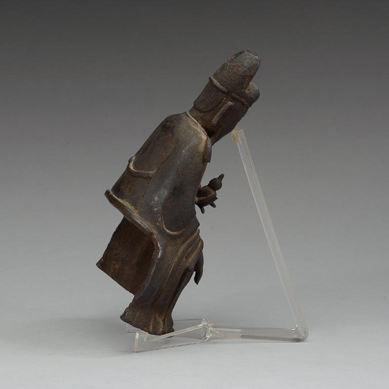 A bronze sculpture of a sitting deity, Ming dynasty (1368-1644).