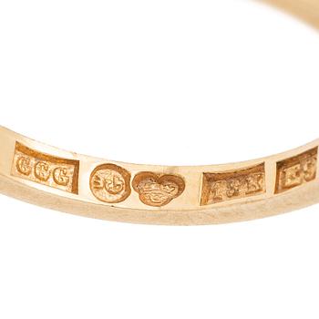18K gold half-eternity ring with octagonal-cut diamonds.