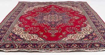 A Tabriz carpet, circa 282 x 293 cm.