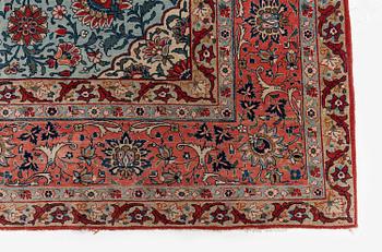 A semi-antique Qum carpet. Central Persia, c. 345 x 258 cm.