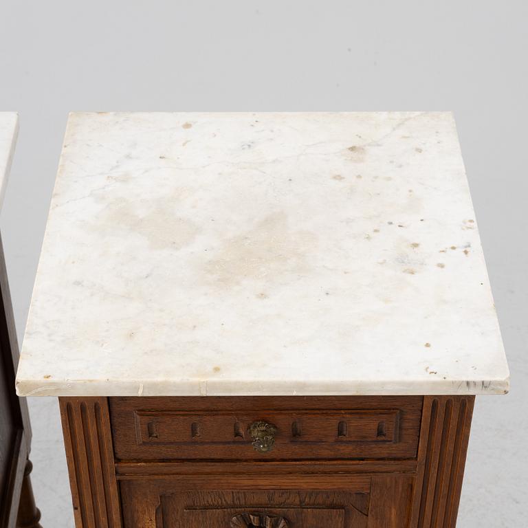 Á pair of bedside tables, circa 1900.