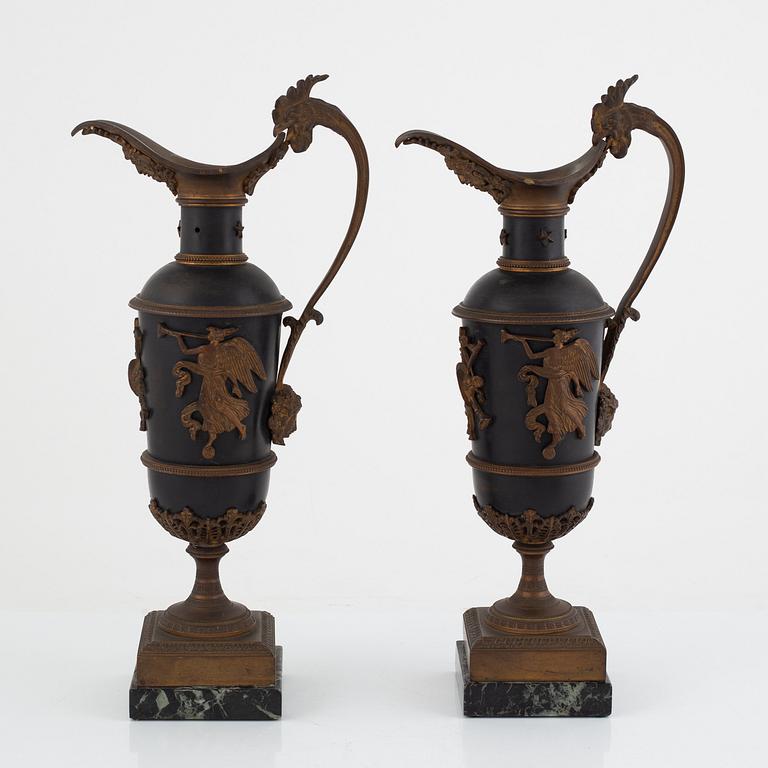 A pair of empire style decoration urns, 19th century.