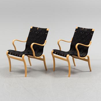 a pair of "Mina" armchairs by Bruno Matsson.