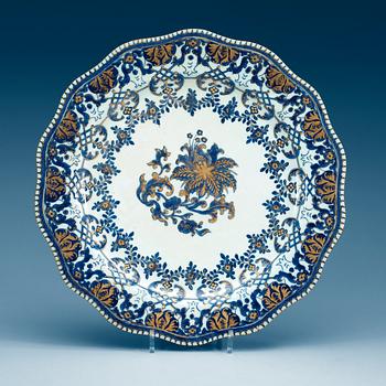 1921. A blue and white dish, Qing dynasty, Qianlong (1736-95).