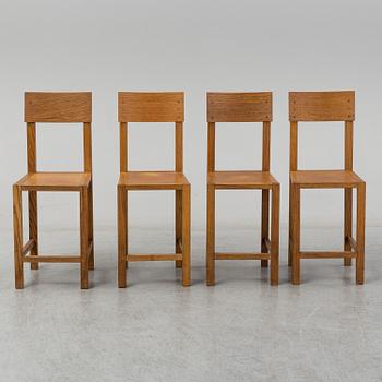 MARIO PRANDINA, an oak table and four chairs, Plinio Il Giovane, Italy.