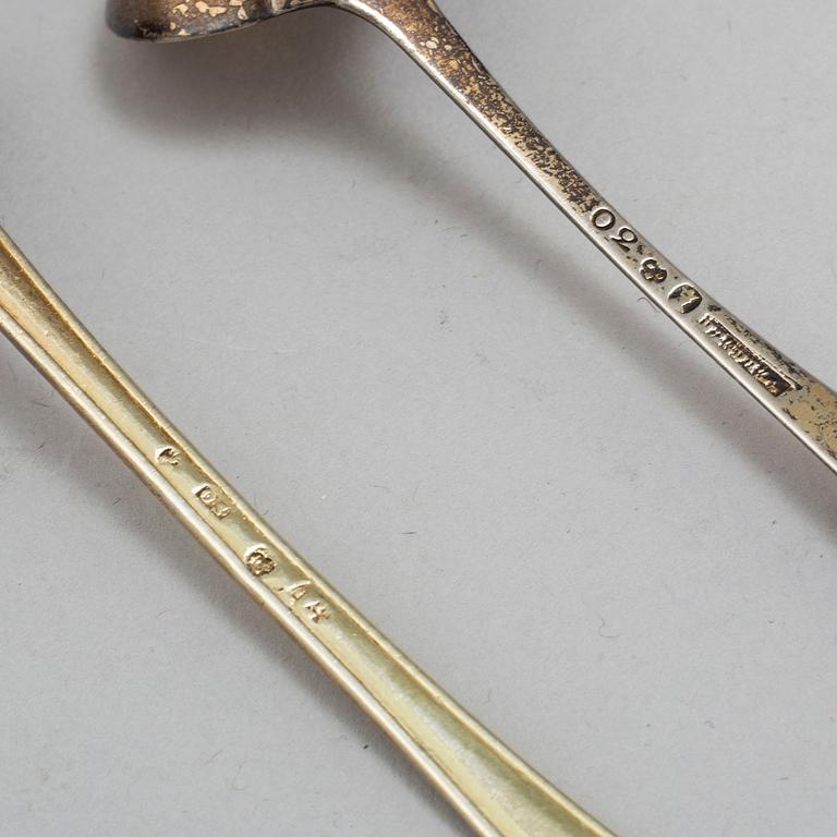 Two silver mustard spoons, 1796 and 1831.