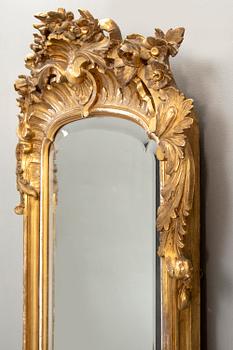 A Swedish Neo Rococo gilded signed mirror 1880s.