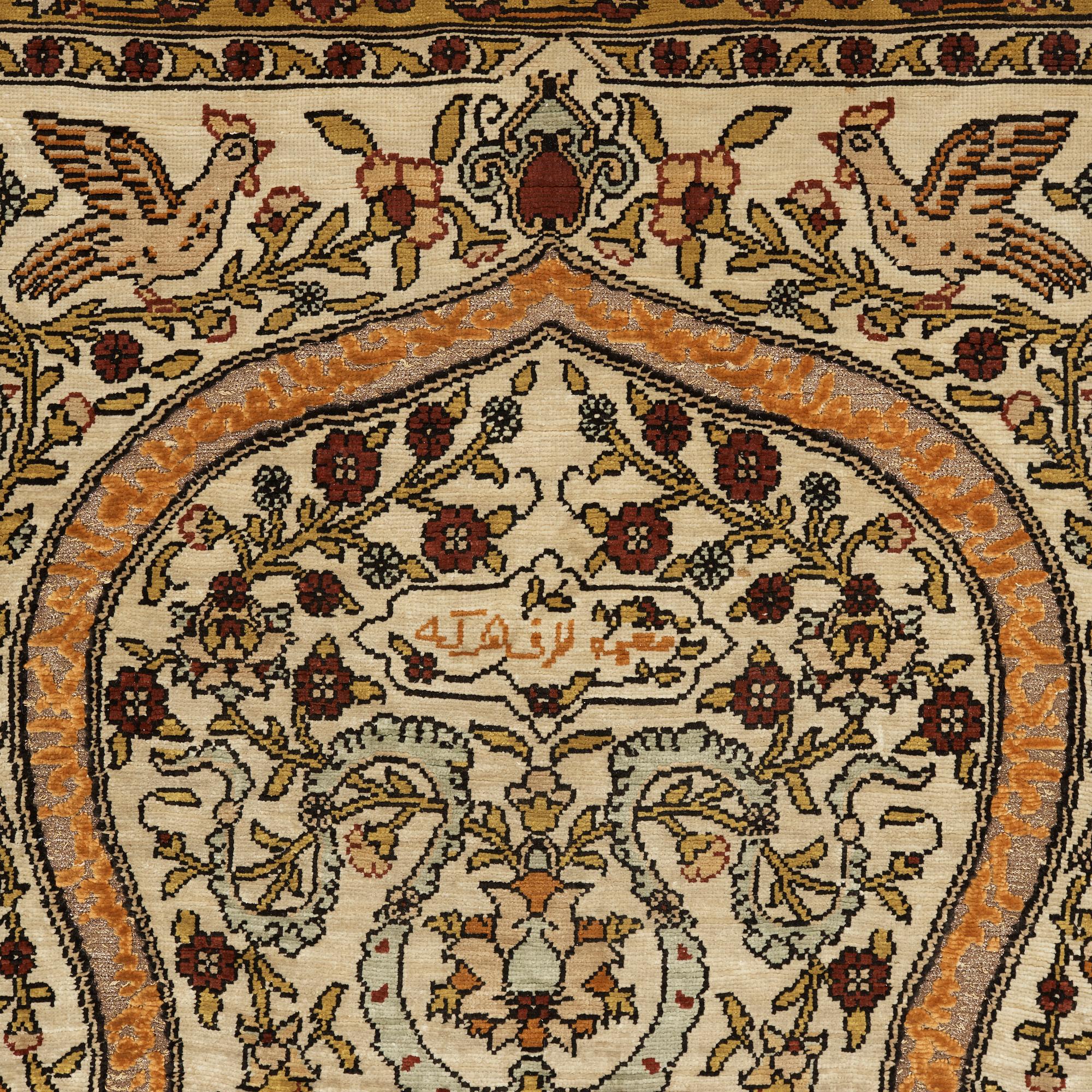 A silk Hereke possibly, around 96 x 66 cm.