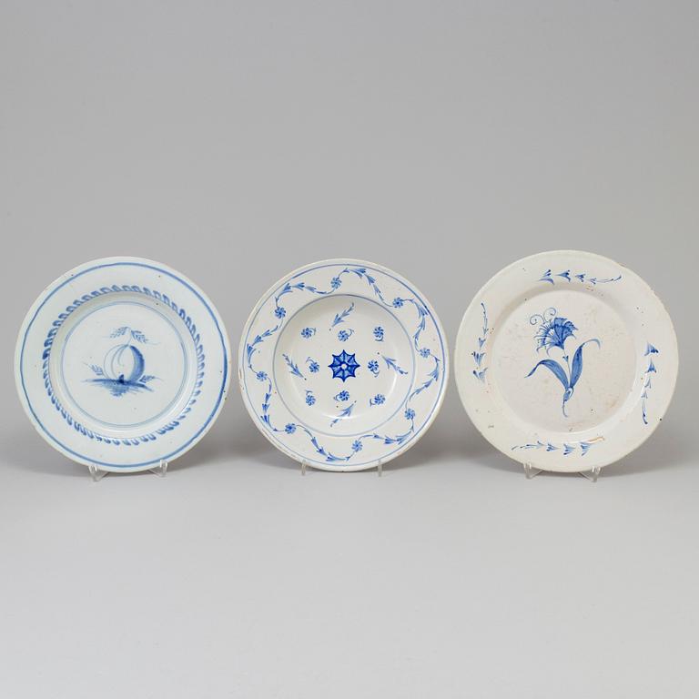 Three Swedish Faiance earthenware dishes, 18th century, one marked 'Rörstrand' and dated 1763.