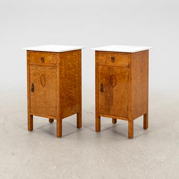 A pair of Art Nouveau bedside tables, early 20th century.