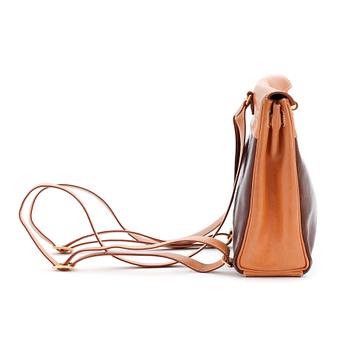 HERMÈS, a calf leather and brown Amazonia leather backpack, "Kelly Ado Backpack":.